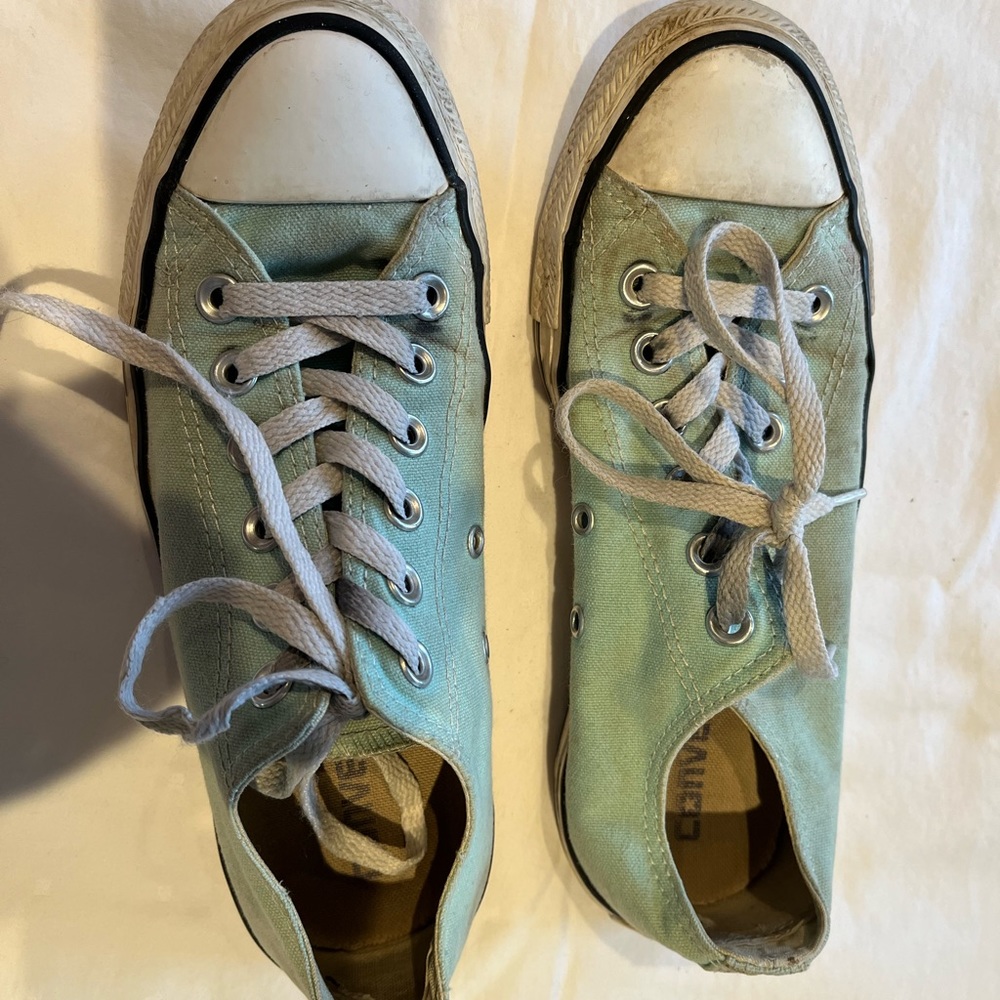 Light blue low top converse, size 7.